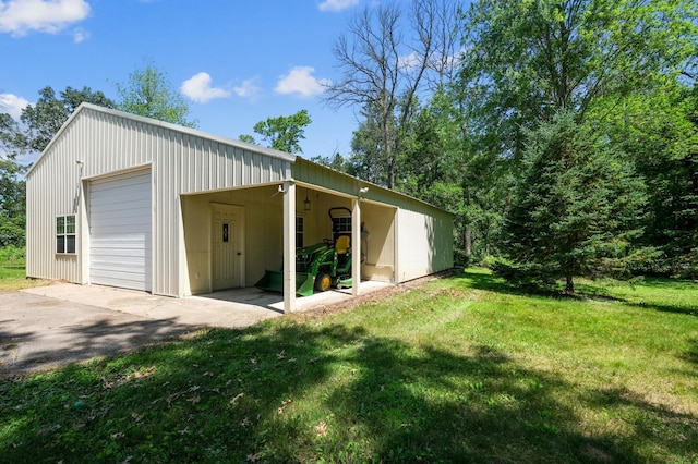 22470 Raven St NW, Oak Grove, MN 55011 - garage with a detached garage and asphalt driveway