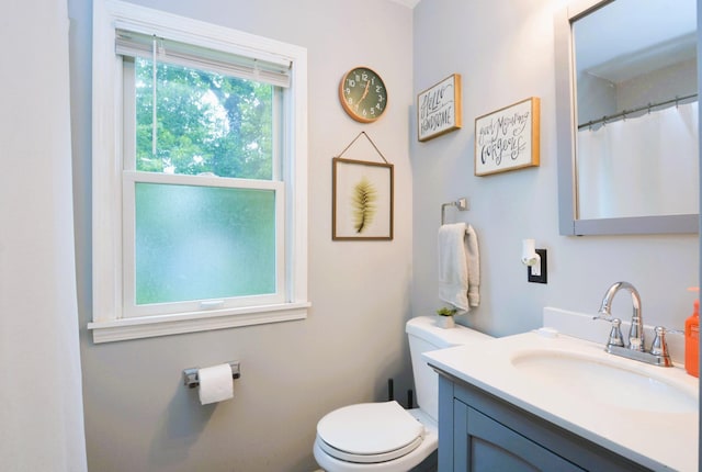 1631 Ross Ave, Saint Paul, MN 55106 - bathroom featuring toilet and vanity
