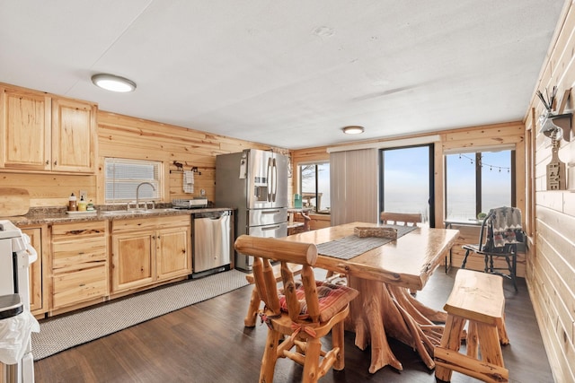 46317 Lucretia Ln, Isle, MN 56342 - dining area with dark wood-type flooring and wooden walls