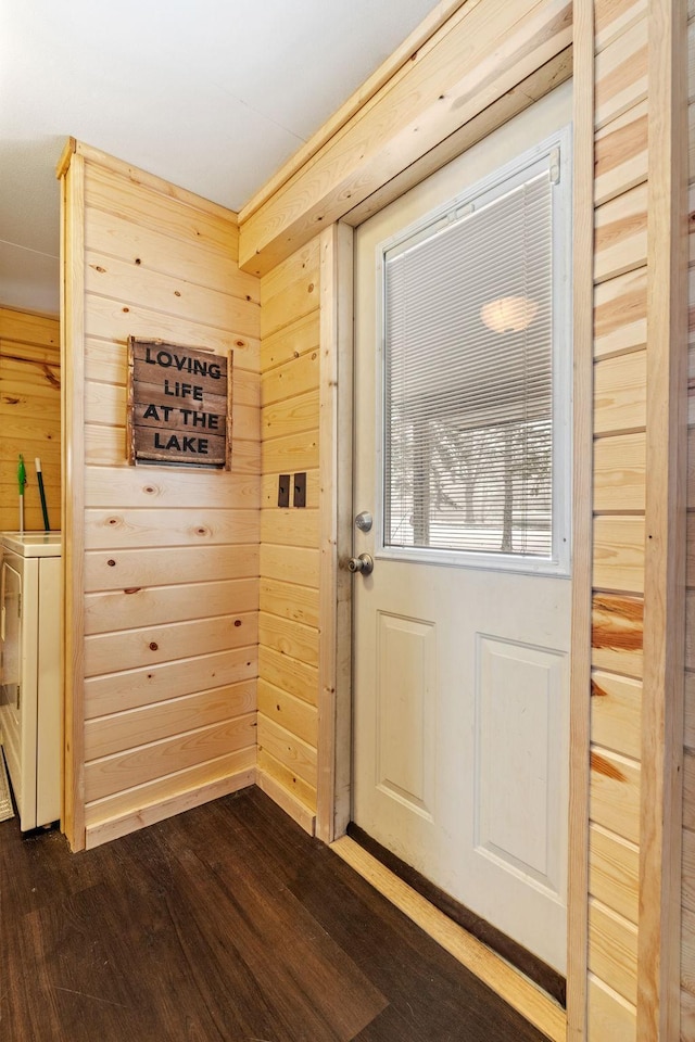 46317 Lucretia Ln, Isle, MN 56342 - entryway featuring wooden walls, dark wood-style flooring, and washer / clothes dryer
