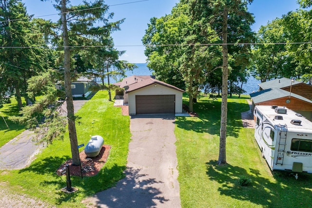 46317 Lucretia Ln, Isle, MN 56342 - view of front of house featuring a detached garage and a front yard