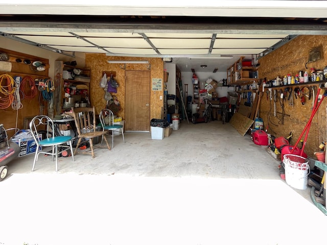 5566 Little Marais Rd, Crystal Bay Twp, MN 55603 - garage with a workshop area