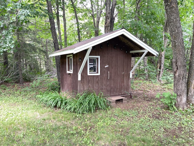 5566 Little Marais Rd, Crystal Bay Twp, MN 55603 - view of outdoor structure with a view of trees