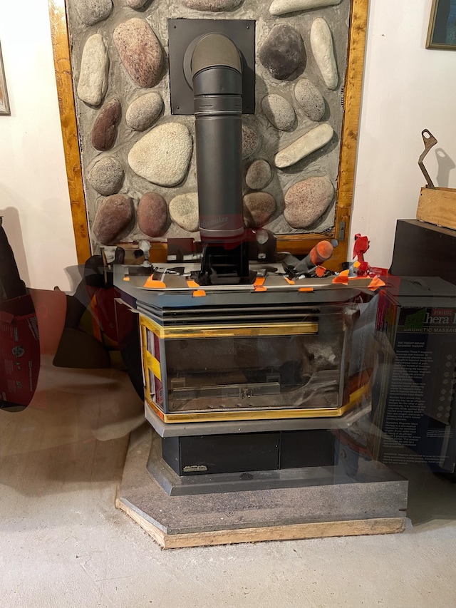 5566 Little Marais Rd, Crystal Bay Twp, MN 55603 - detailed view of a wood stove