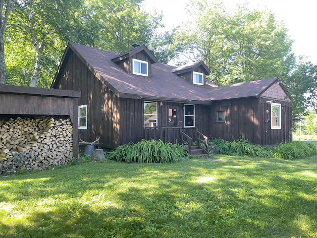 5566 Little Marais Rd, Crystal Bay Twp, MN 55603 - view of front facade featuring a front lawn
