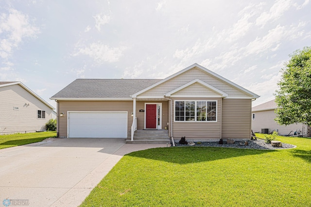 3730 Taylor St S, Fargo, ND 58104 - ranch-style house with a garage, a front lawn, and concrete driveway