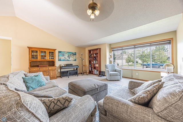3730 Taylor St S, Fargo, ND 58104 - living room with a ceiling fan, lofted ceiling, and carpet floors