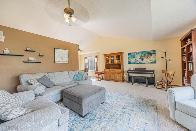 3730 Taylor St S, Fargo, ND 58104 - living room with ceiling fan, lofted ceiling, carpet floors, and a textured ceiling