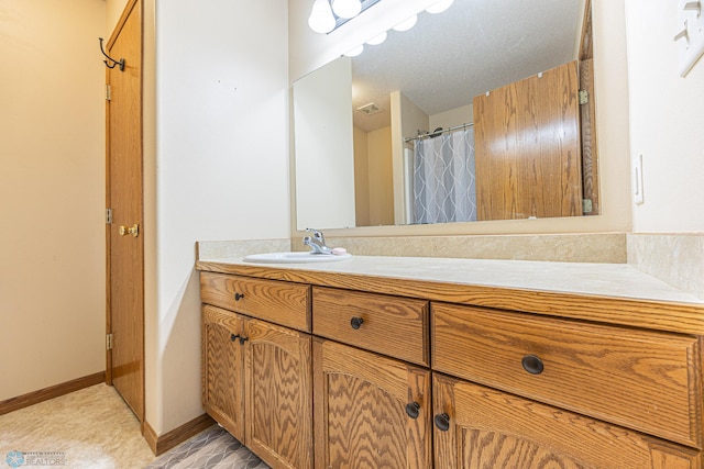 3730 Taylor St S, Fargo, ND 58104 - bathroom featuring vanity and baseboards