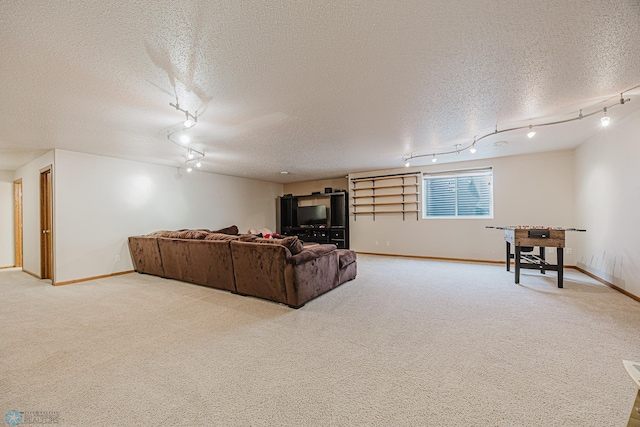 3730 Taylor St S, Fargo, ND 58104 - carpeted living room with rail lighting and a textured ceiling