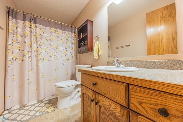 3730 Taylor St S, Fargo, ND 58104 - bathroom featuring vanity, tile patterned floors, curtained shower, and a textured ceiling