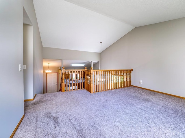 133 Summerfield Ct, Waverly, MN 55390 - spare room with lofted ceiling and carpet flooring