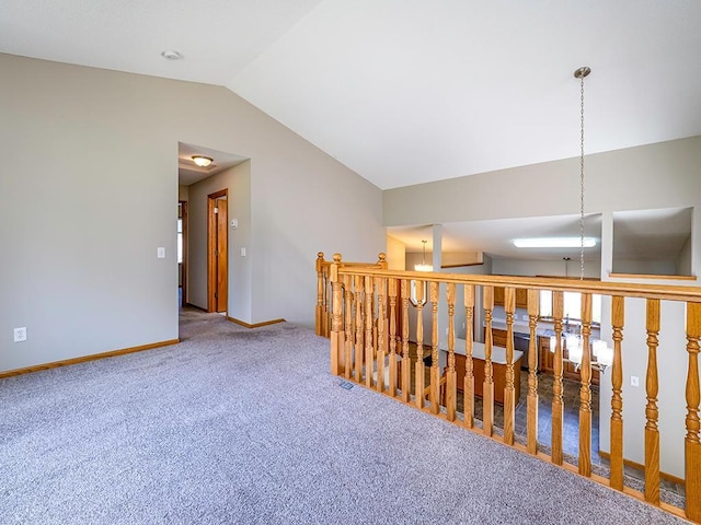 133 Summerfield Ct, Waverly, MN 55390 - corridor featuring vaulted ceiling and carpet flooring