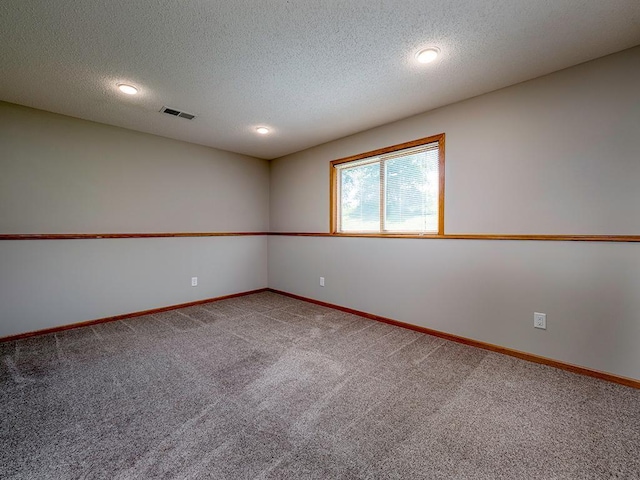 133 Summerfield Ct, Waverly, MN 55390 - empty room featuring carpet, a textured ceiling, and recessed lighting