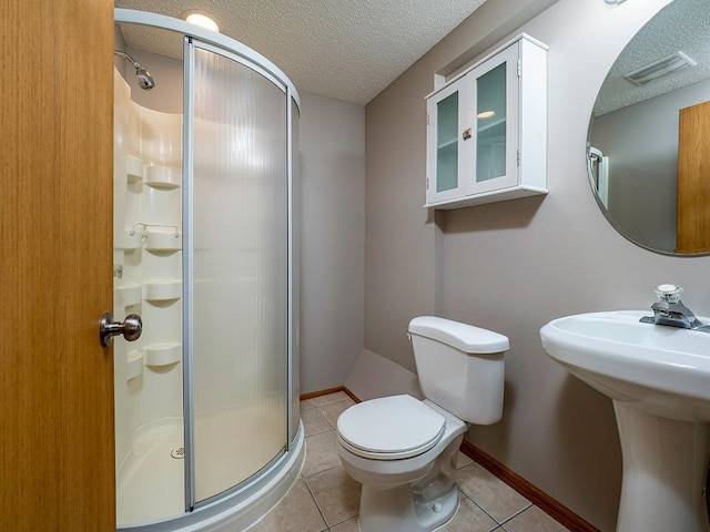 133 Summerfield Ct, Waverly, MN 55390 - bathroom with a stall shower, a textured ceiling, and tile patterned flooring