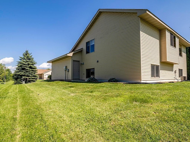 133 Summerfield Ct, Waverly, MN 55390 - back of house featuring a lawn