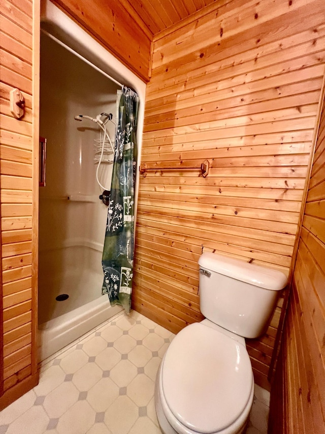 1002 6th Ave N, Wheaton, MN 56296 - bathroom with wood walls, a stall shower, and wood ceiling