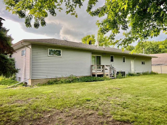 1002 6th Ave N, Wheaton, MN 56296 - back of house with a yard and a wooden deck