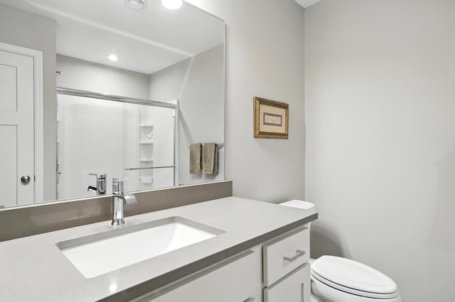 4364 Ginger Dr, Minnetrista, MN 55331 - full bathroom with vanity, a shower with shower door, and recessed lighting