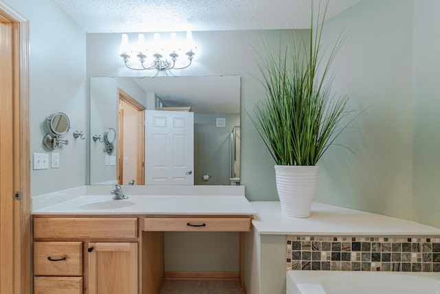 625 Wesley Commons Dr Unit 36, Golden Valley, MN 55427 - bathroom with vanity, a garden tub, and a textured ceiling