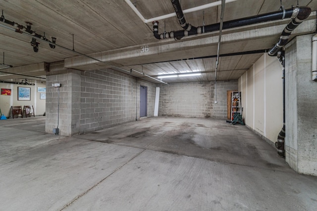 625 Wesley Commons Dr Unit 36, Golden Valley, MN 55427 - parking deck featuring concrete block wall