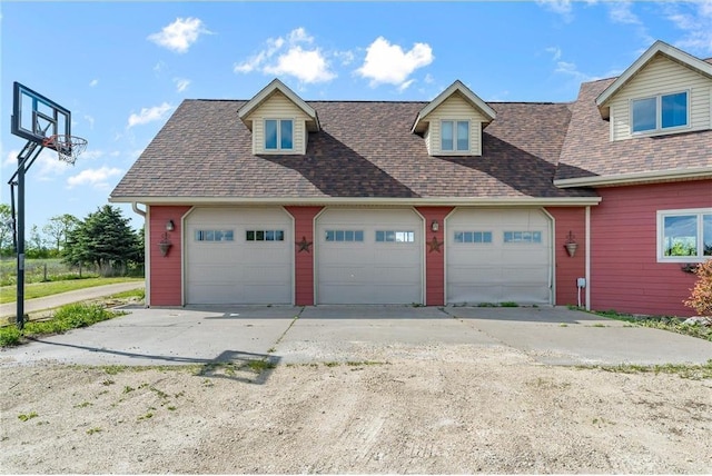 2832 130th Ave, Glenwood City, WI 54013 - view of front of property with a shingled roof, concrete driveway, and a garage