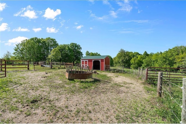 2832 130th Ave, Glenwood City, WI 54013 - view of yard with an outdoor structure, a view of countryside, and an exterior structure