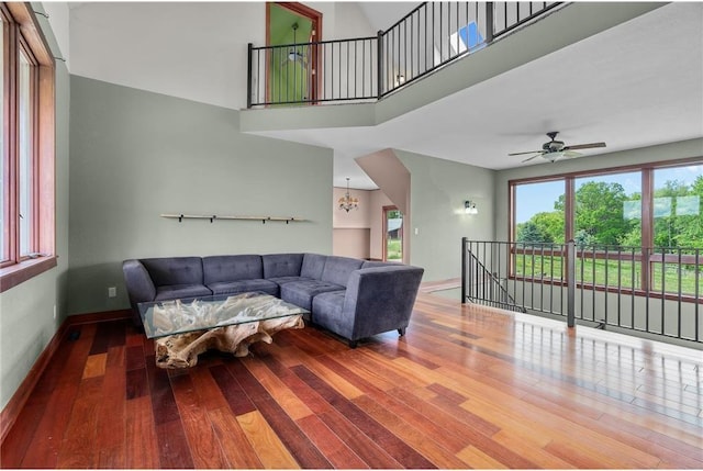 2832 130th Ave, Glenwood City, WI 54013 - living room featuring hardwood / wood-style flooring, a ceiling fan, and a towering ceiling