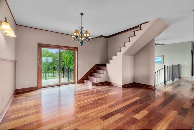 2832 130th Ave, Glenwood City, WI 54013 - interior space featuring hardwood / wood-style floors, stairs, and a chandelier