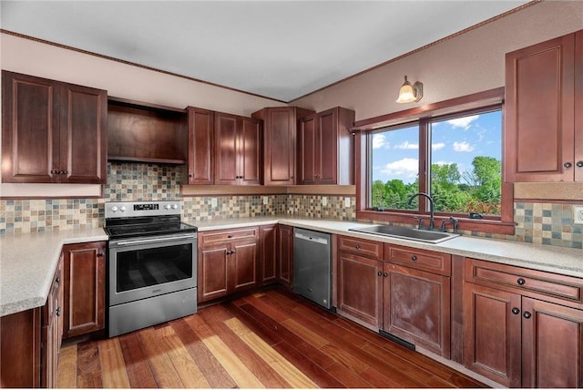 2832 130th Ave, Glenwood City, WI 54013 - kitchen featuring appliances with stainless steel finishes, light countertops, backsplash, and dark wood-style floors