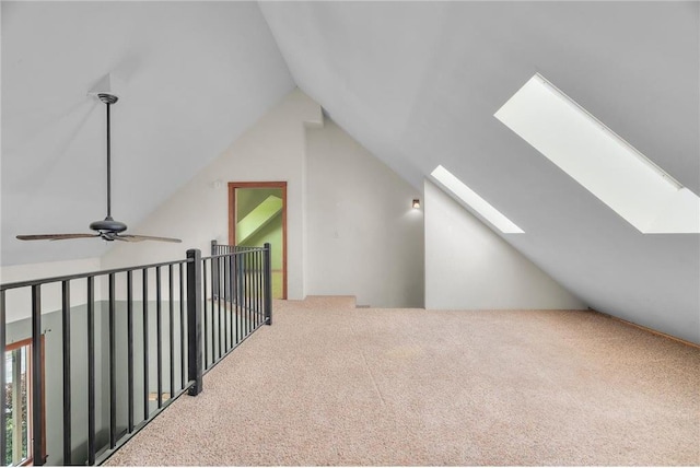 2832 130th Ave, Glenwood City, WI 54013 - additional living space featuring lofted ceiling, carpet floors, a skylight, and ceiling fan