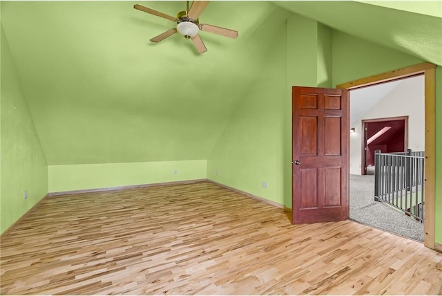 2832 130th Ave, Glenwood City, WI 54013 - additional living space with vaulted ceiling, wood finished floors, and ceiling fan