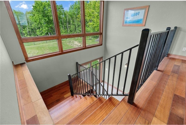 2832 130th Ave, Glenwood City, WI 54013 - staircase featuring wood finished floors