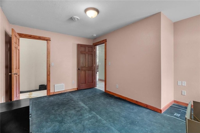 2832 130th Ave, Glenwood City, WI 54013 - unfurnished bedroom with baseboards and carpet flooring