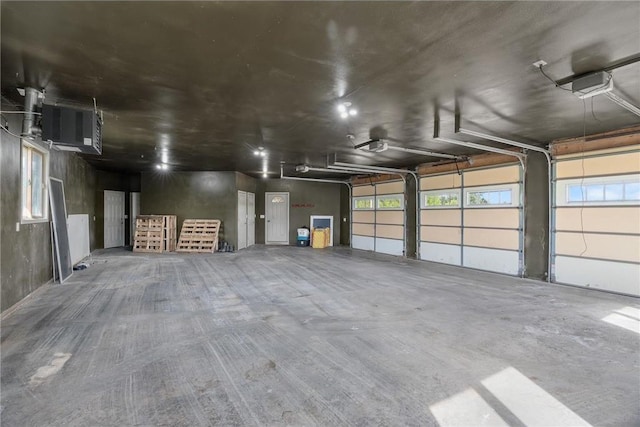 2832 130th Ave, Glenwood City, WI 54013 - garage featuring a garage door opener and a heating unit