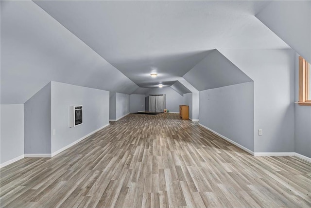 2832 130th Ave, Glenwood City, WI 54013 - additional living space featuring light wood-style flooring and lofted ceiling