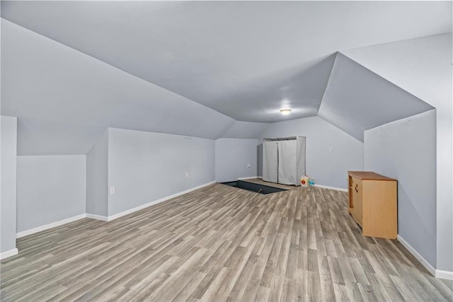 2832 130th Ave, Glenwood City, WI 54013 - additional living space featuring light wood-style flooring and lofted ceiling