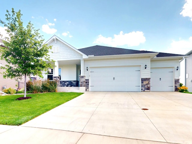 15613 116th Ave N, Dayton, MN 55369 - craftsman-style house with a garage, a front lawn, stone siding, and driveway