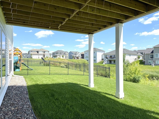 15613 116th Ave N, Dayton, MN 55369 - fenced backyard featuring a residential view and a playground