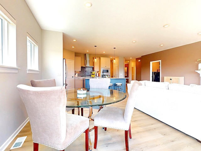 15613 116th Ave N, Dayton, MN 55369 - dining space with light wood-style flooring and recessed lighting