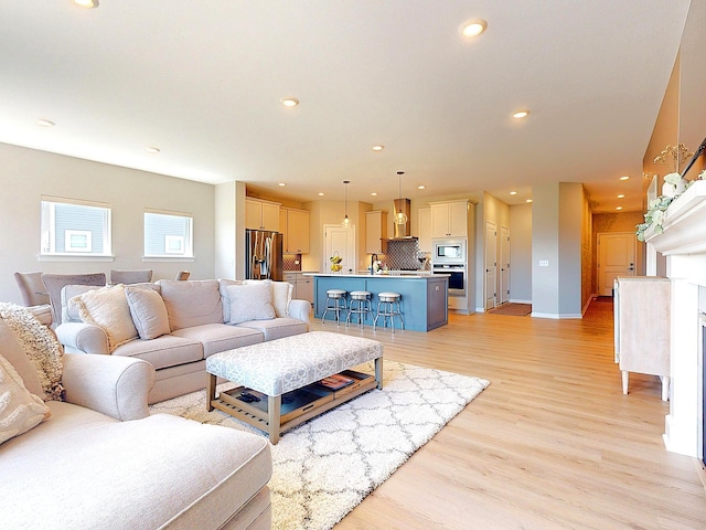 15613 116th Ave N, Dayton, MN 55369 - living room featuring light wood finished floors and recessed lighting