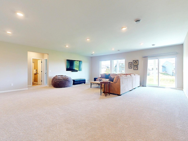 15613 116th Ave N, Dayton, MN 55369 - living area featuring light carpet, healthy amount of natural light, and recessed lighting