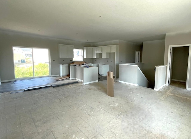 9752 32nd St NE, Saint Michael, MN 55376 - unfurnished living room featuring baseboards