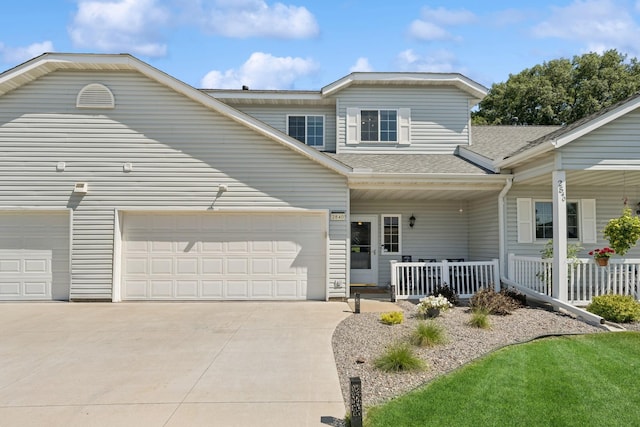 2840 Brewers Ln, Stillwater, MN 55082 - view of front of home with covered porch, driveway, a garage, and a shingled roof