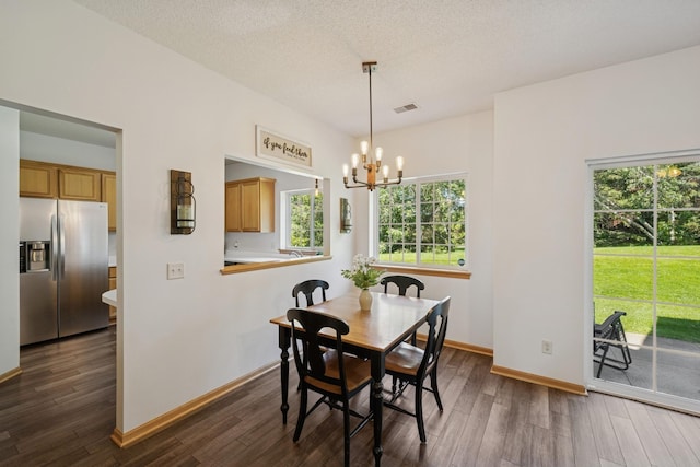 2840 Brewers Ln, Stillwater, MN 55082 - dining space with a chandelier, dark wood finished floors, and a textured ceiling