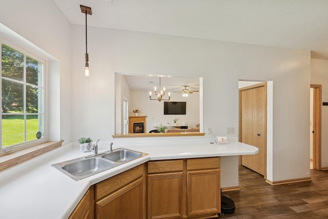 2840 Brewers Ln, Stillwater, MN 55082 - kitchen featuring dark wood-style floors, plenty of natural light, light countertops, and hanging light fixtures