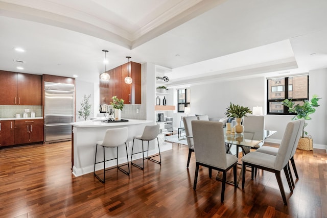 100 3rd Ave S Unit 805, Minneapolis, MN 55401 - dining room featuring ornamental molding, a tray ceiling, wood finished floors, and recessed lighting