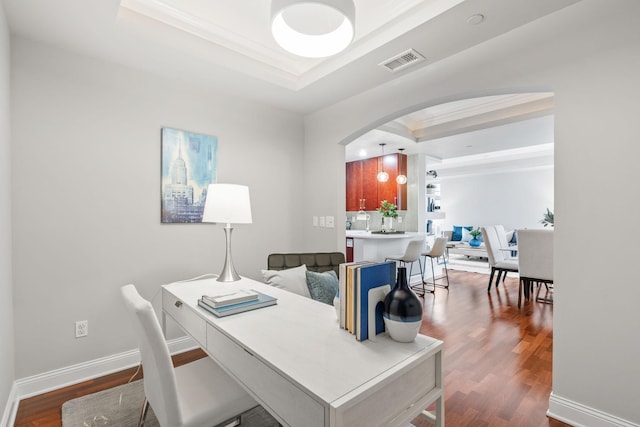 100 3rd Ave S Unit 805, Minneapolis, MN 55401 - office featuring a tray ceiling, dark wood finished floors, arched walkways, and ornamental molding