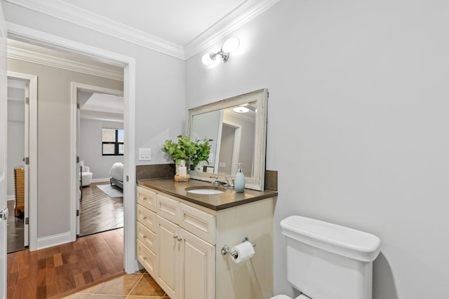 100 3rd Ave S Unit 805, Minneapolis, MN 55401 - bathroom featuring ornamental molding, vanity, and wood finished floors