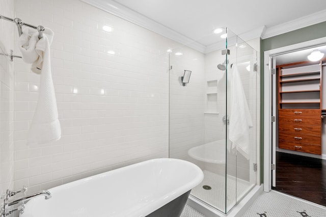 100 3rd Ave S Unit 805, Minneapolis, MN 55401 - full bath featuring ornamental molding, a stall shower, a soaking tub, and tile patterned floors